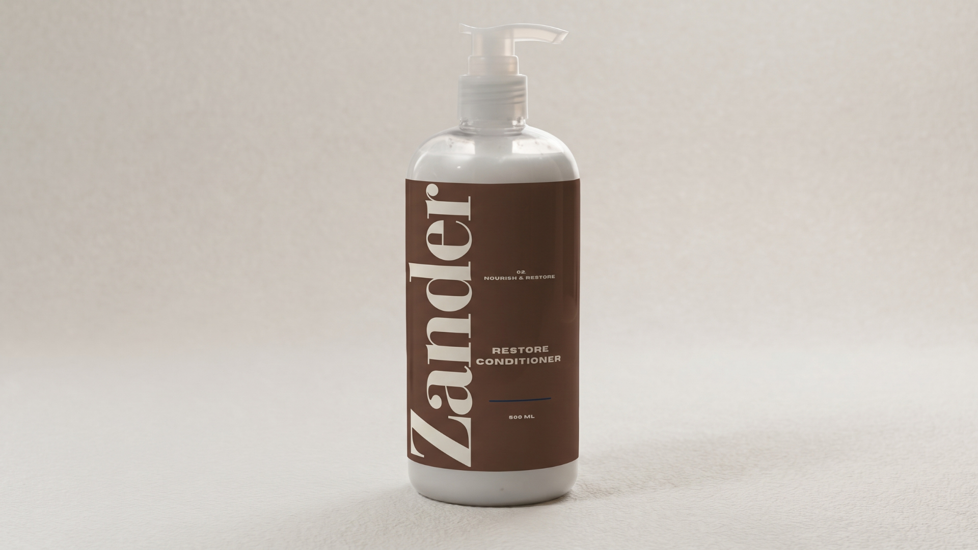 Matte cocoa brown Zander Moisture Restore conditioner bottle with champagne gold pump on limestone